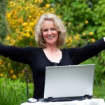 CL BLog—Sand gen—woman thumbs up laptop outside