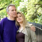 boomer couple walking down street