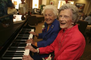 Gwyn Matthews, 84, a resident of Revera’s The Beechwood Retirement Community in Mississauga, plays the piano with Mayor Hazel McCallion Tuesday at the Residence’s Grand Opening.