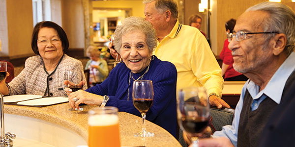 An Elderly Lady Smiling at a Social Event